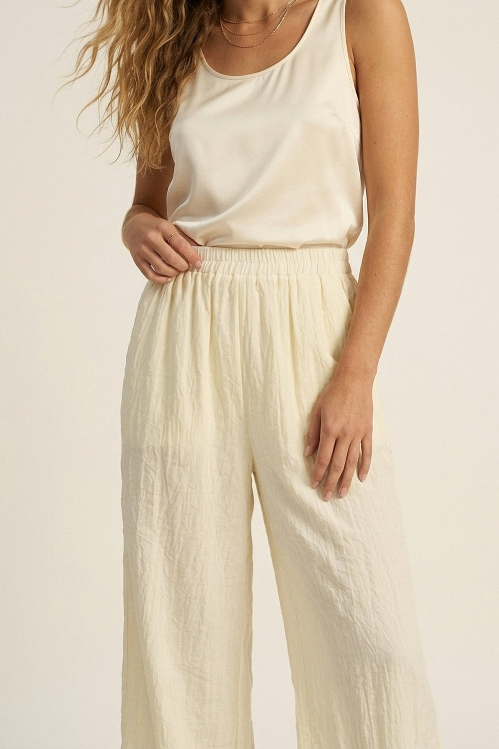 Cream Wide-Leg Pants with sheer fabric
