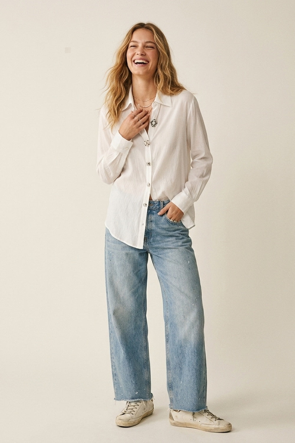 UNIKCOSA White Embellished Button-Down Blouse in tencel fabric
