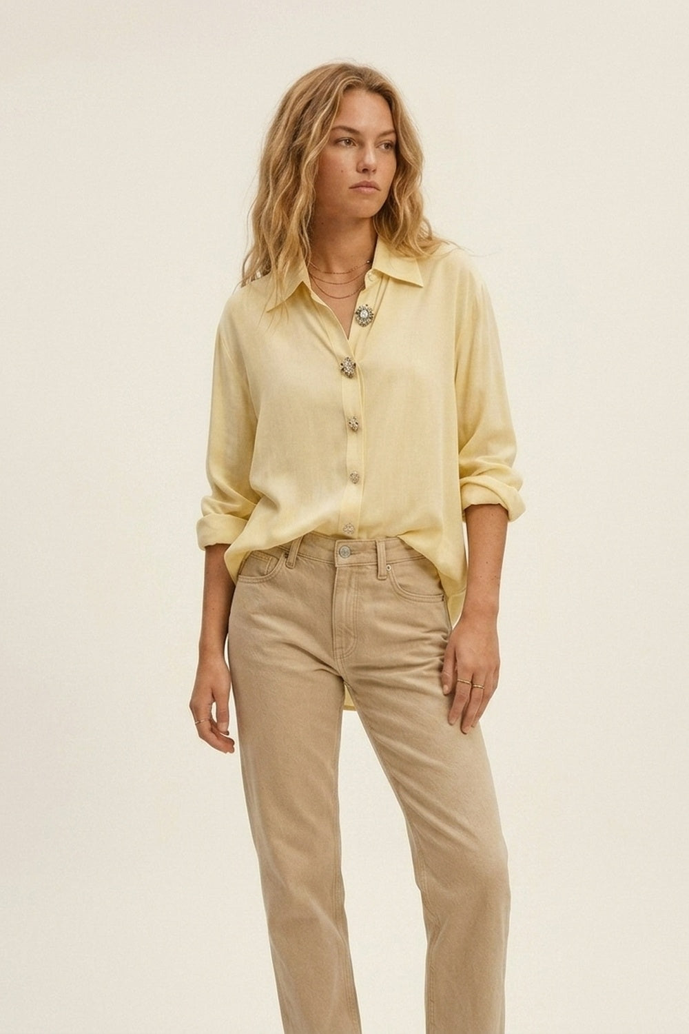 UNIKCOSA Butter Yellow Embellished Button-Down Blouse in tencel fabric