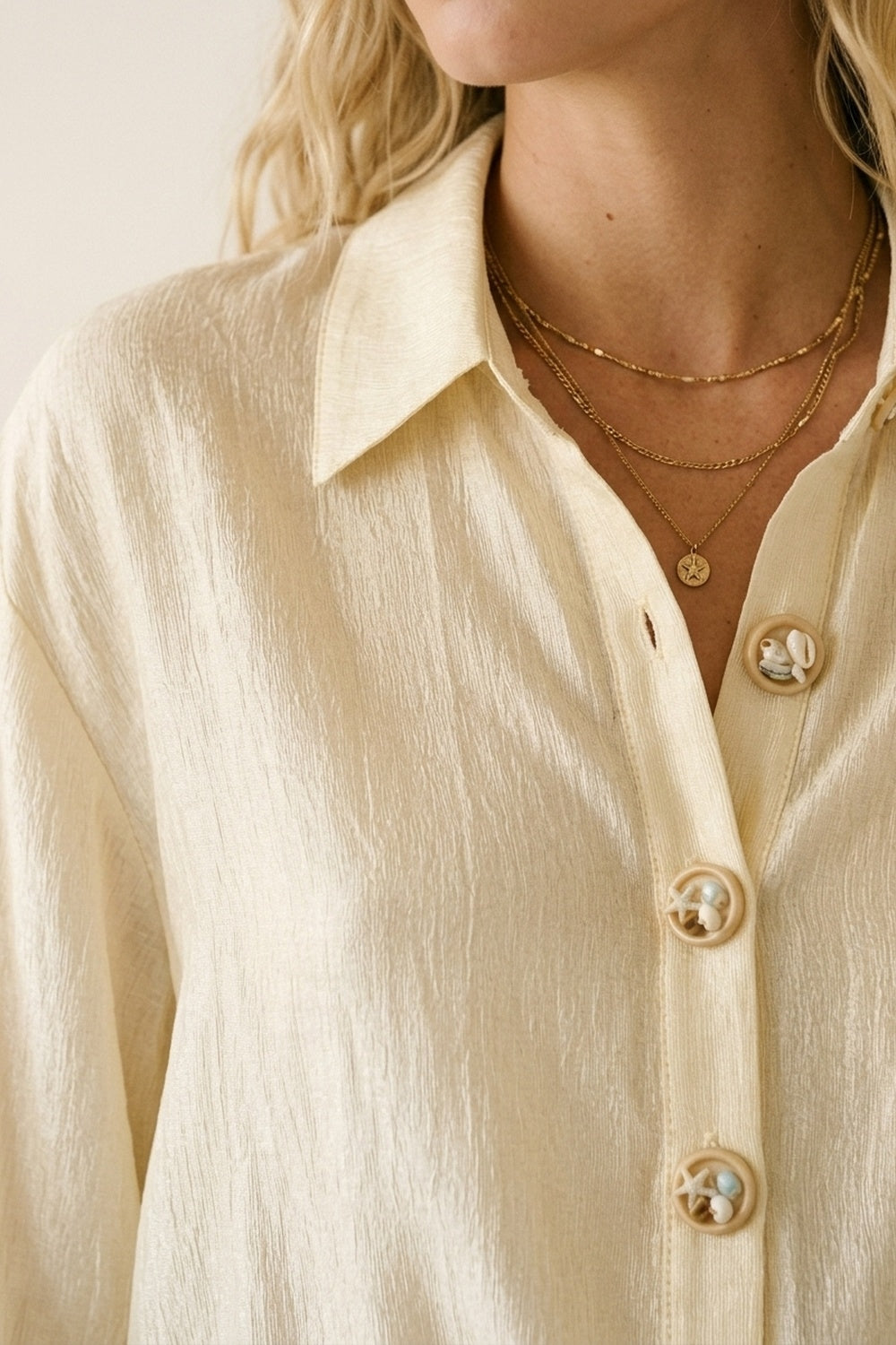 bright fabric beige blouse with retro buttons