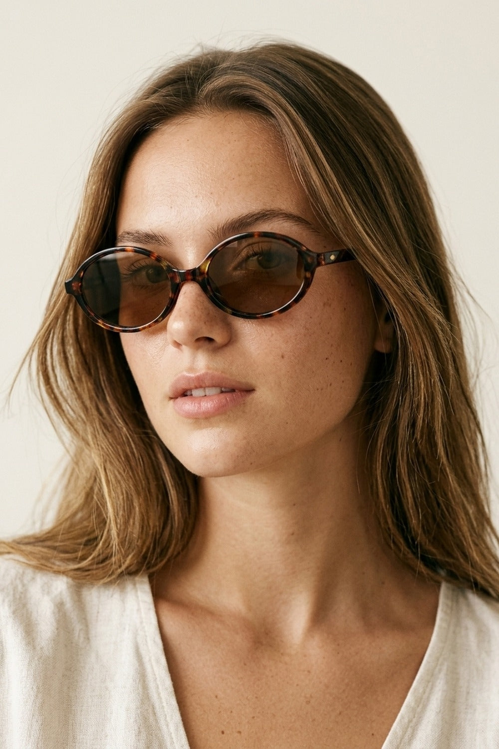 UNIKCOSA Multicolor Tortoiseshell Oval Frame Brown Lens Sunglasses