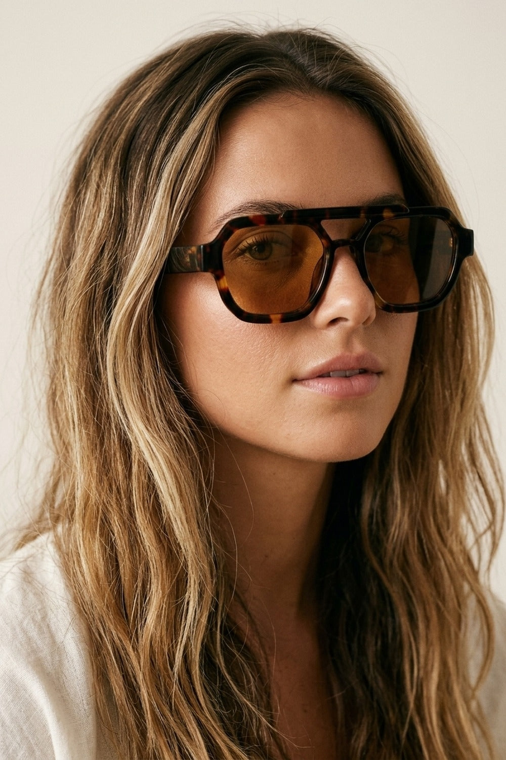 UNIKCOSA Multicolor Tortoiseshell Acrylic Cutout Bridge Oversize Sunglasses