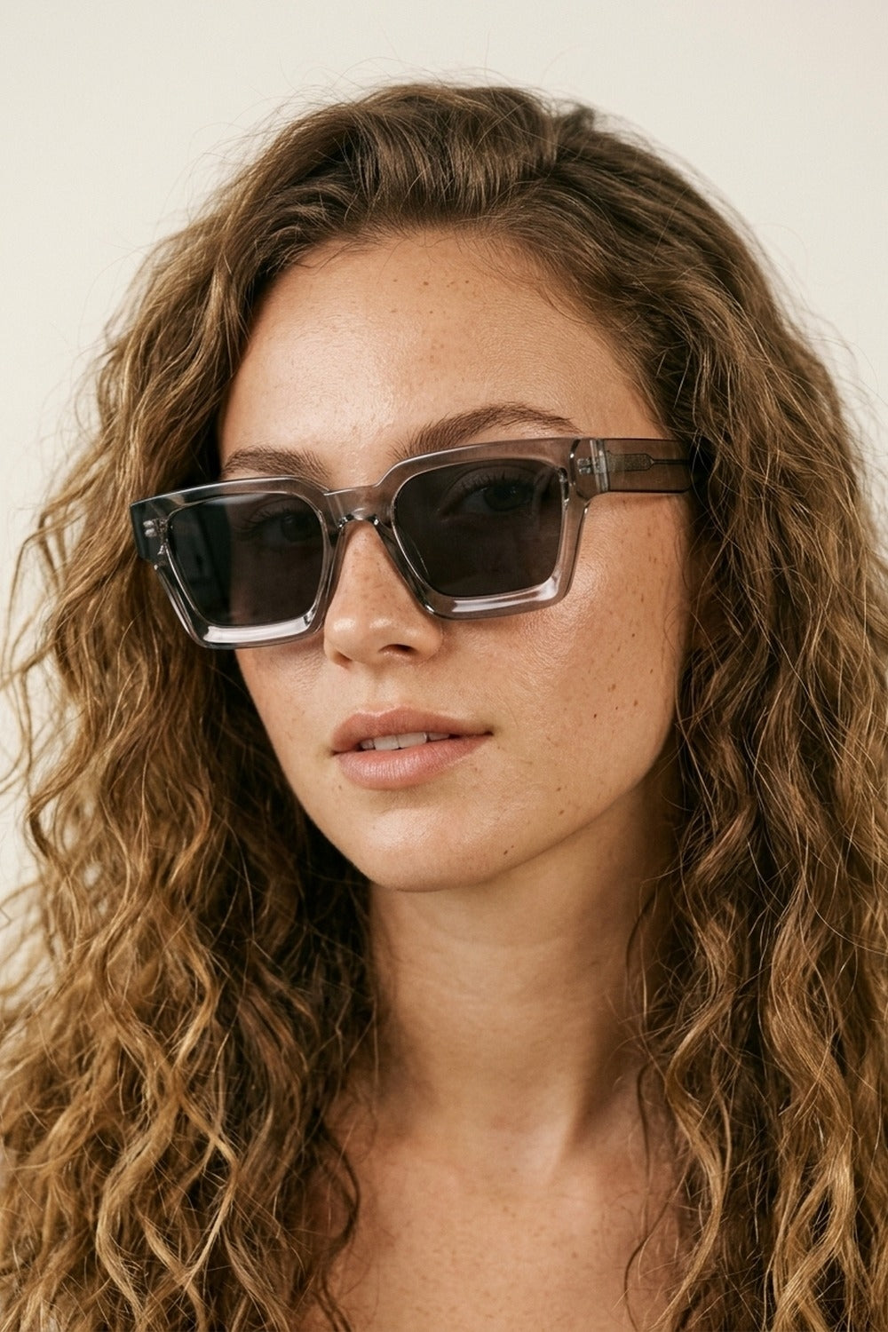 UNIKCOSA Grey Transparent Square Frame Dark Lens Fashion Sunglasses