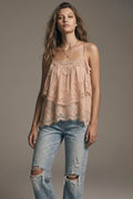 Woman wearing beige lace chiffon tiered ruffle cami top