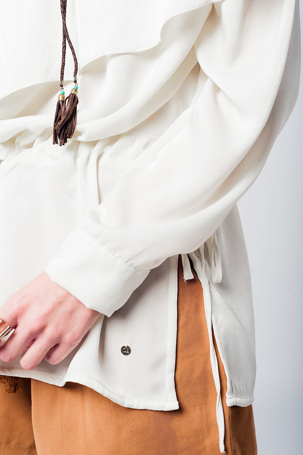 Soft beige blouse with drawstring