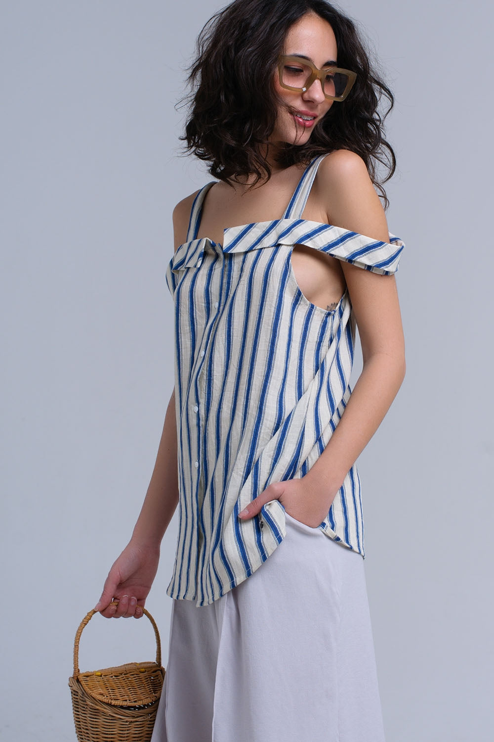 Cream top with blue stripes