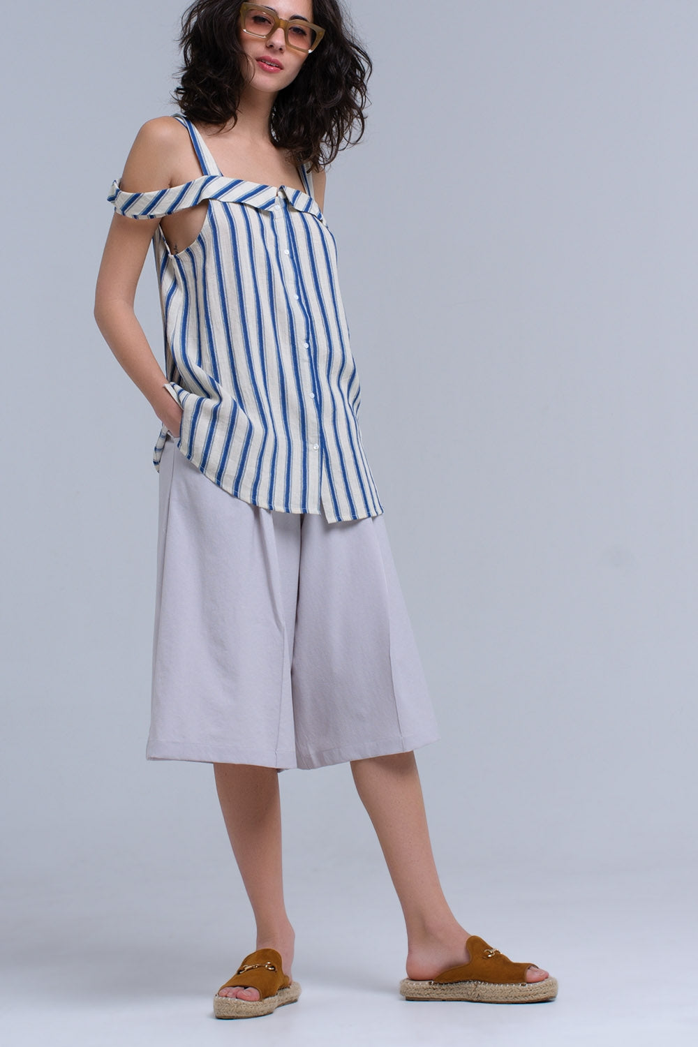Cream top with blue stripes