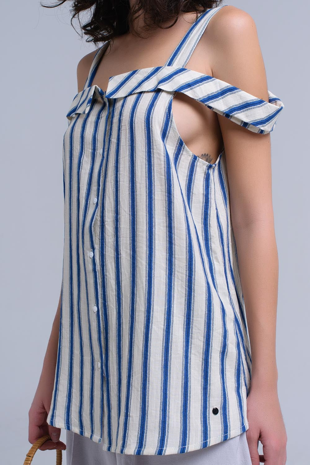 Cream top with blue stripes