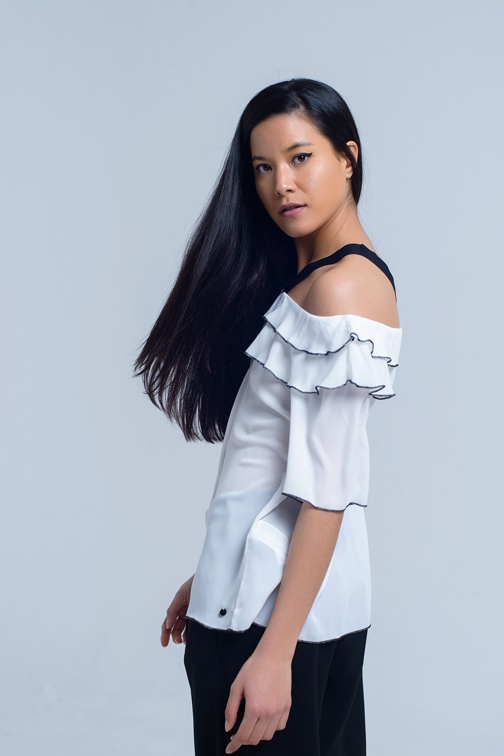 White top with black contrast trim