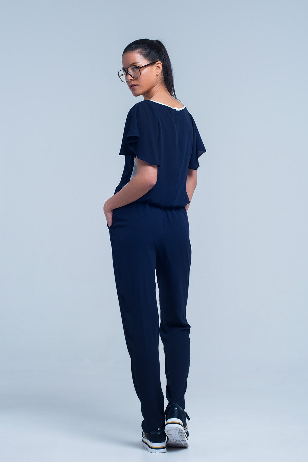 UNIKCOSA Navy blue jumpsuit with short sleeve and ruffle detail