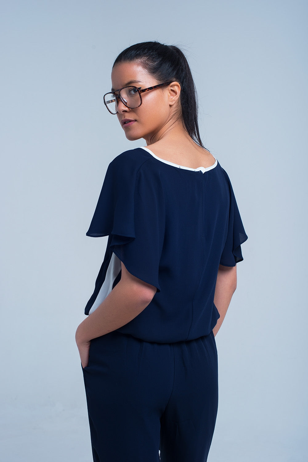 UNIKCOSA Navy blue jumpsuit with short sleeve and ruffle detail