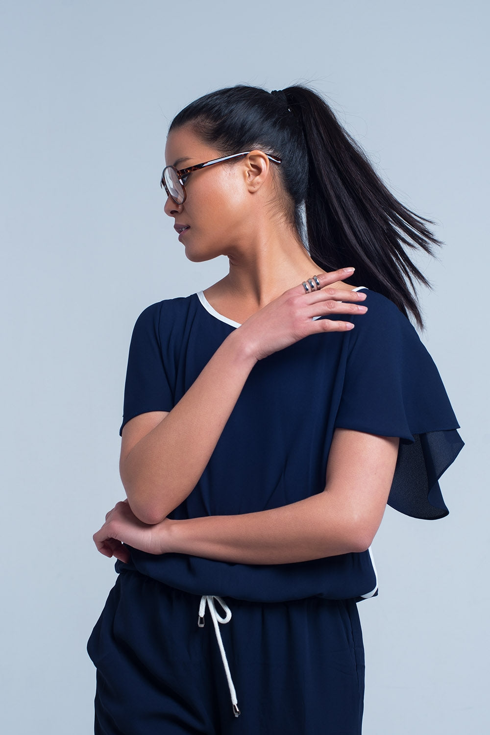 UNIKCOSA Navy blue jumpsuit with short sleeve and ruffle detail