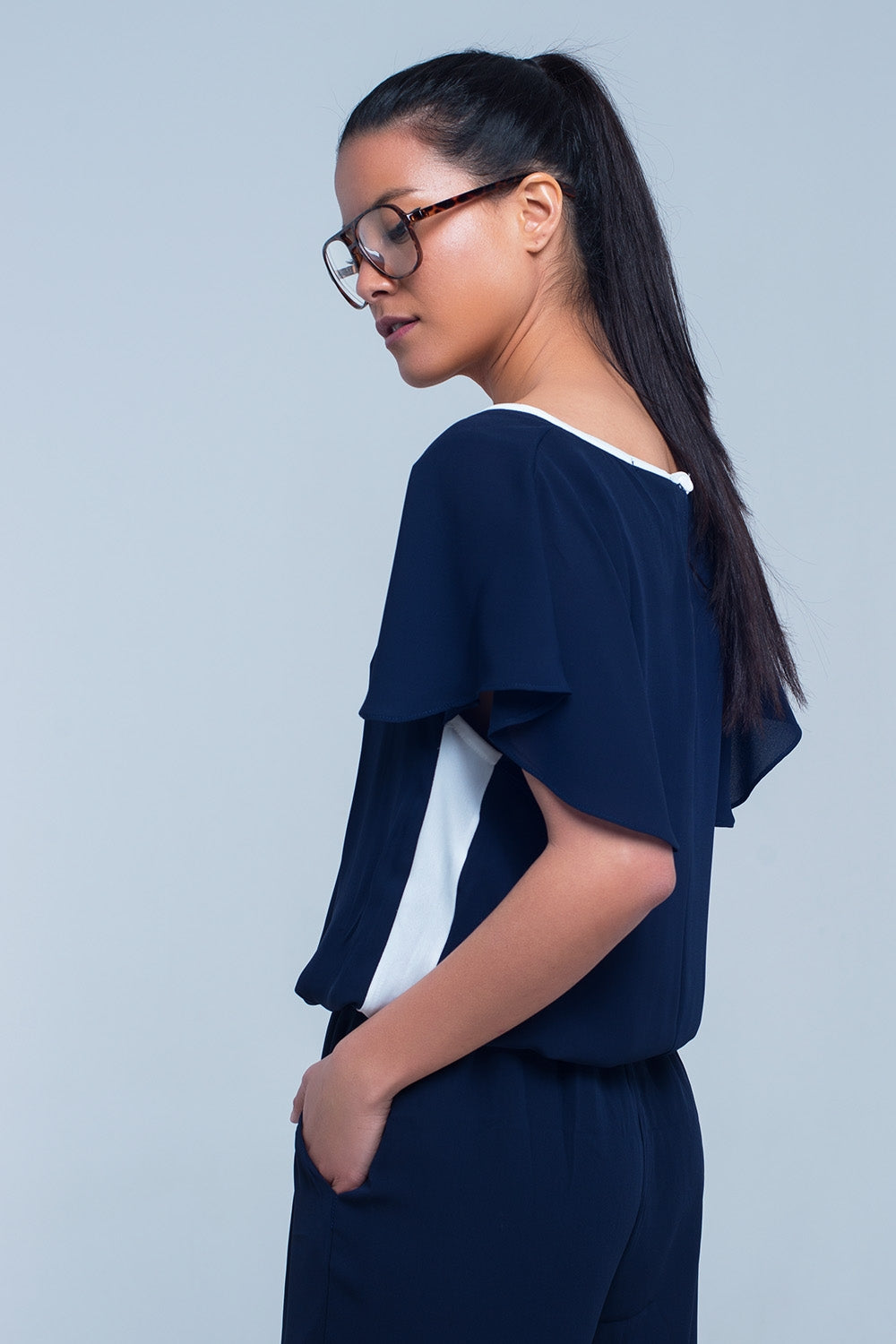 UNIKCOSA Navy blue jumpsuit with short sleeve and ruffle detail