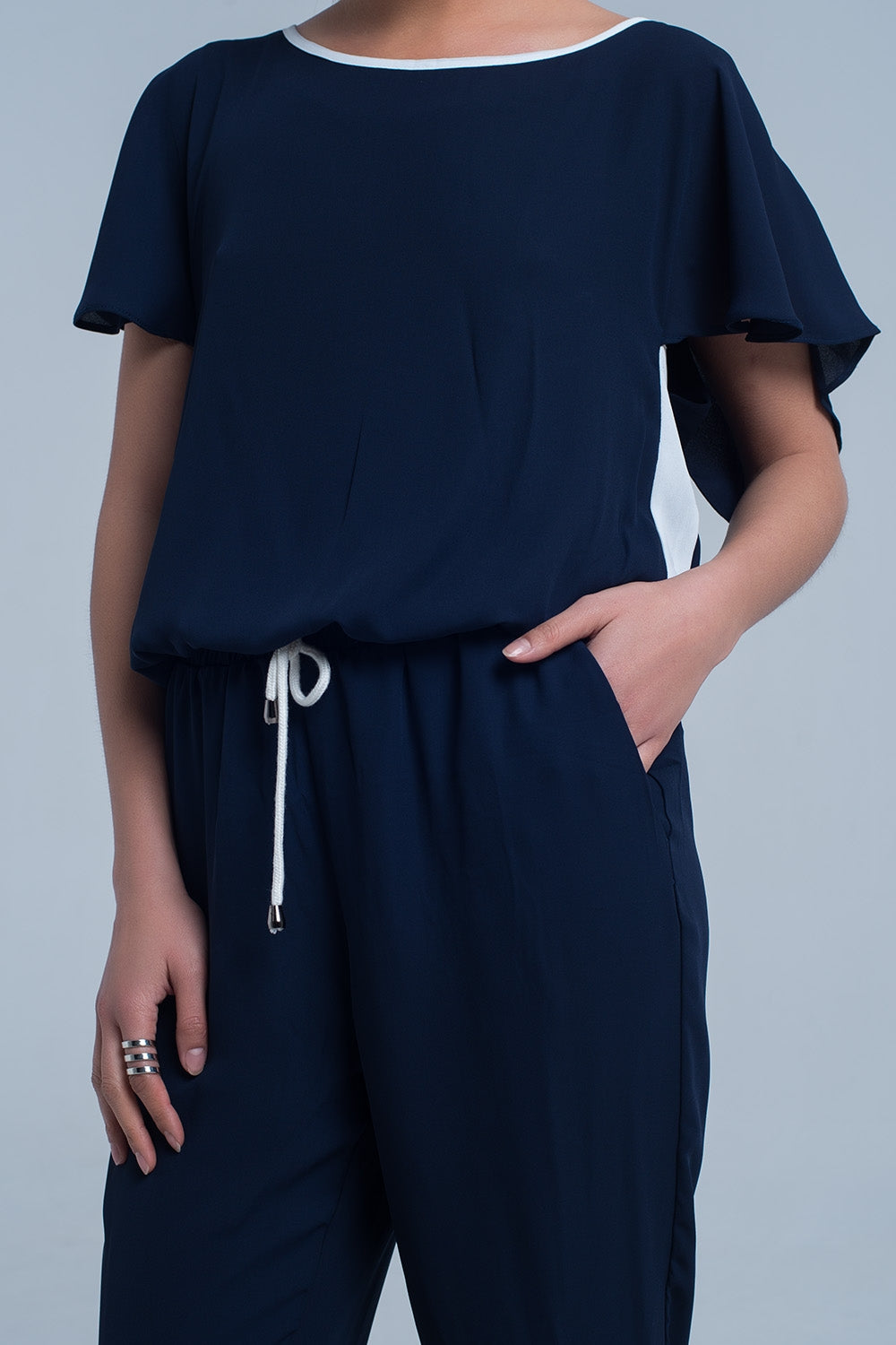 UNIKCOSA Navy blue jumpsuit with short sleeve and ruffle detail