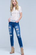 Jean with shredded rips and raw-cut cuffs