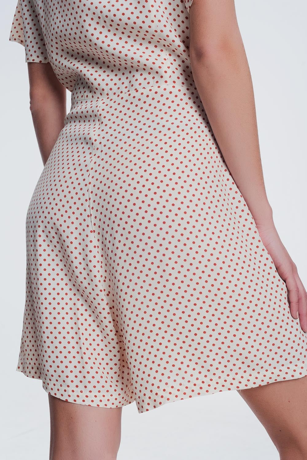 UNIKCOSA button front jumpsuit in beige