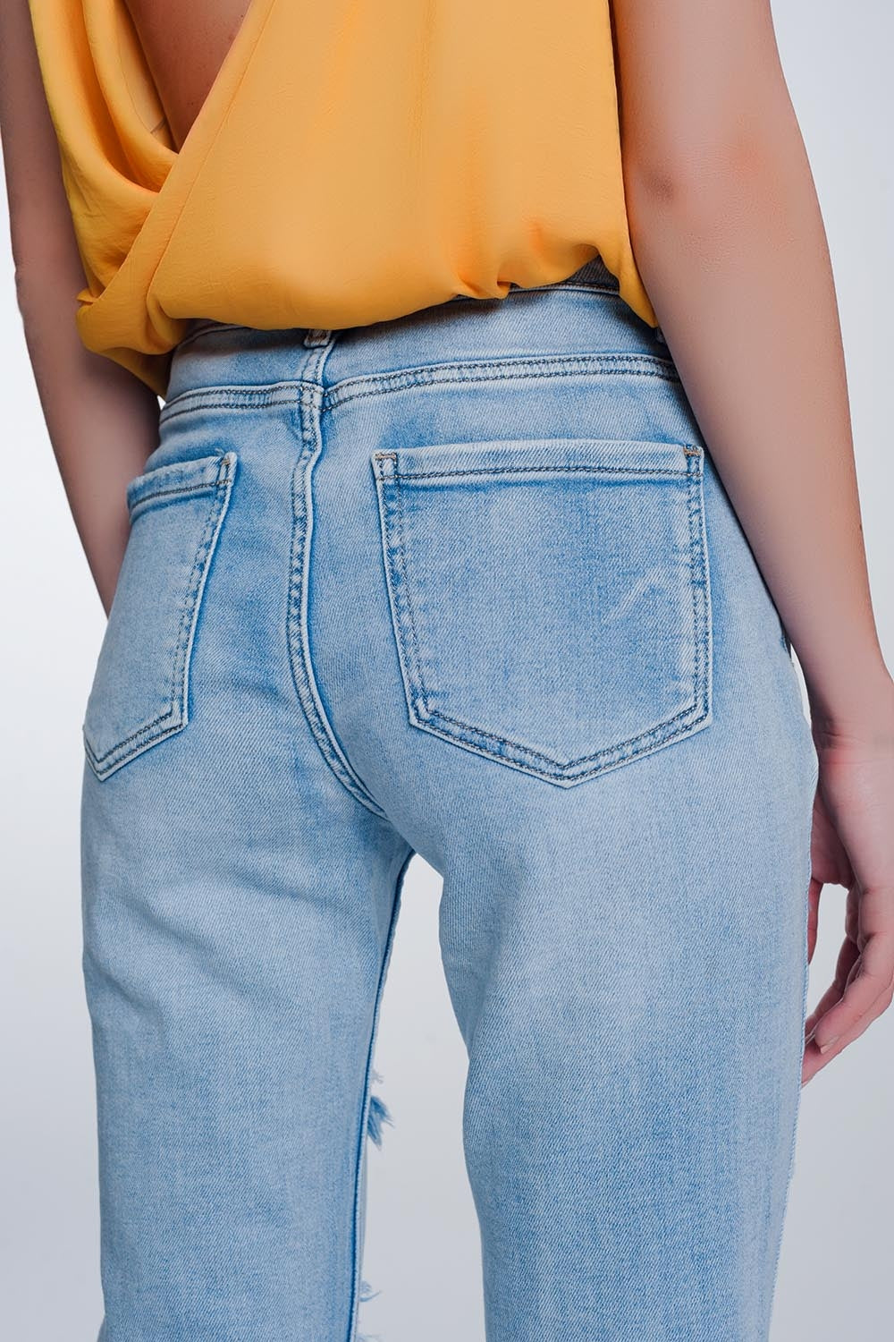 wide leg cropped raw hem jeans in blue colour