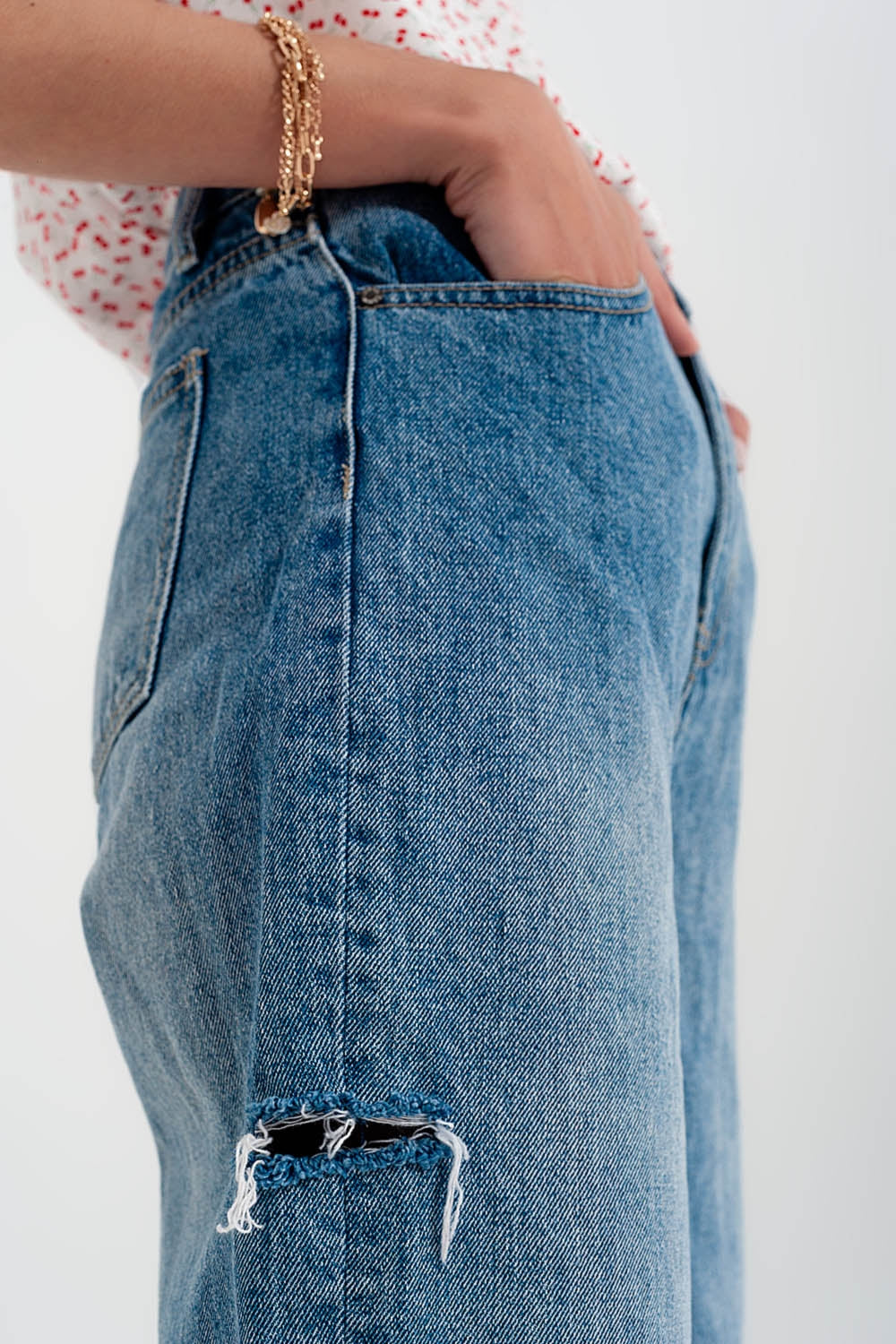 Relaxed fit side rip jeans in mid blue