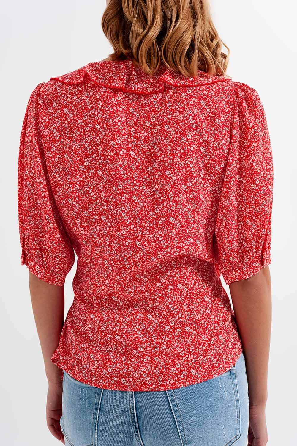 Red wrap top in clustered flower print