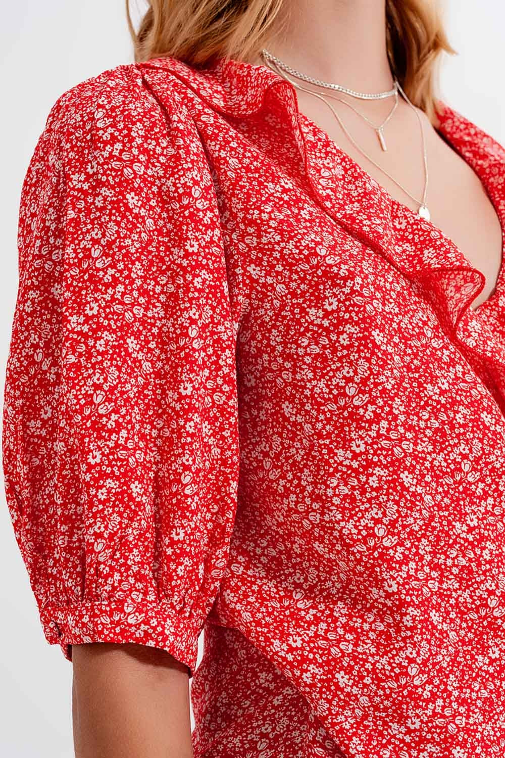 Red wrap top in clustered flower print