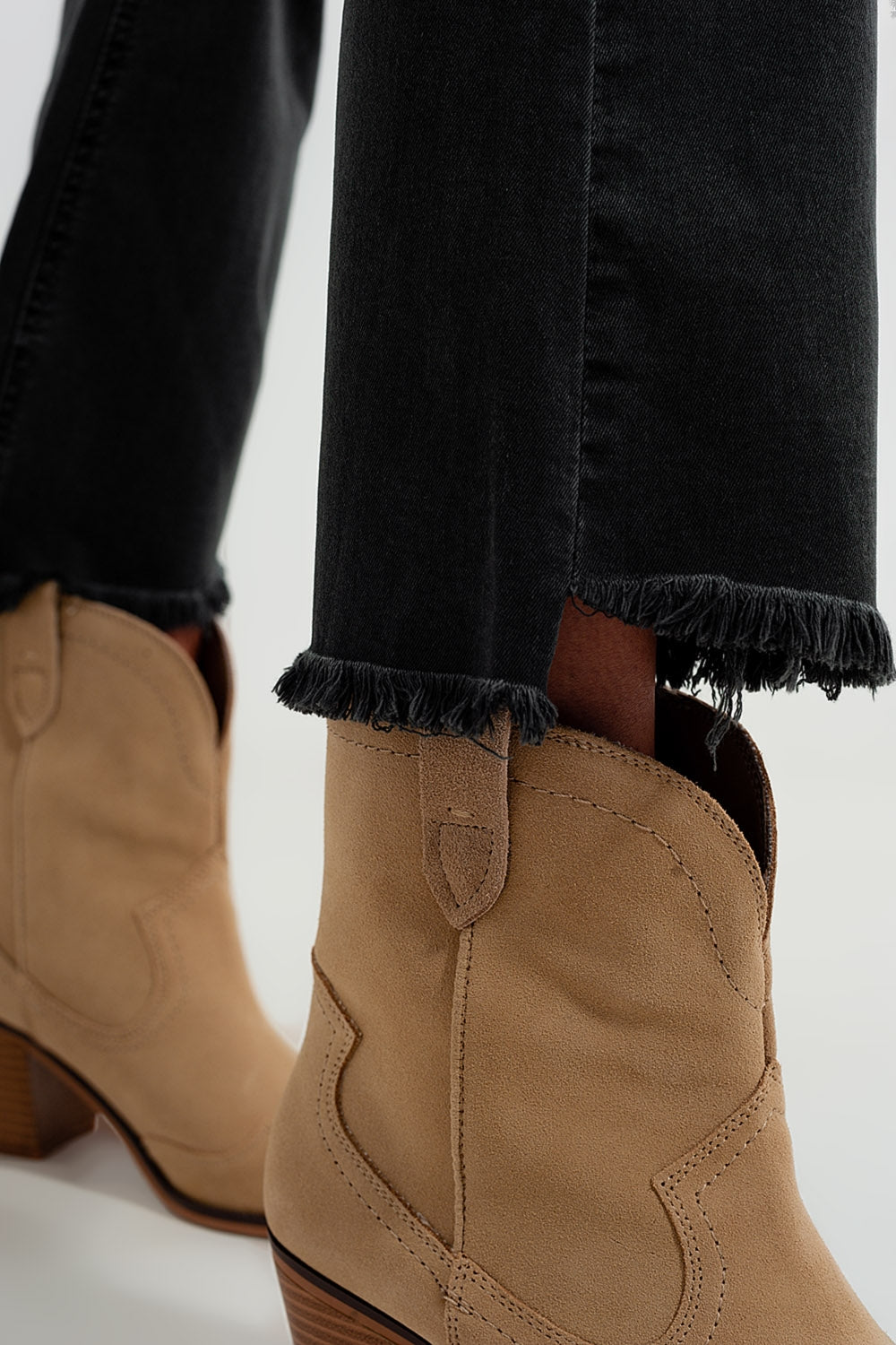 Flare jeans in dark grey with asymmetric detail