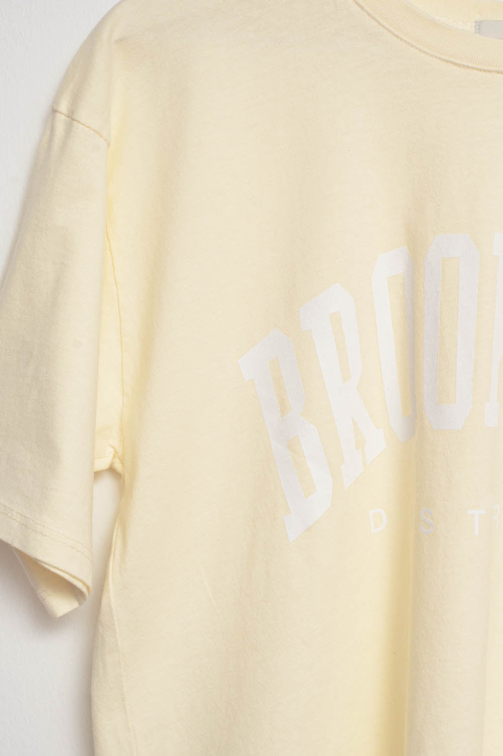 T-Shirt with Brooklyn District Text in yellow