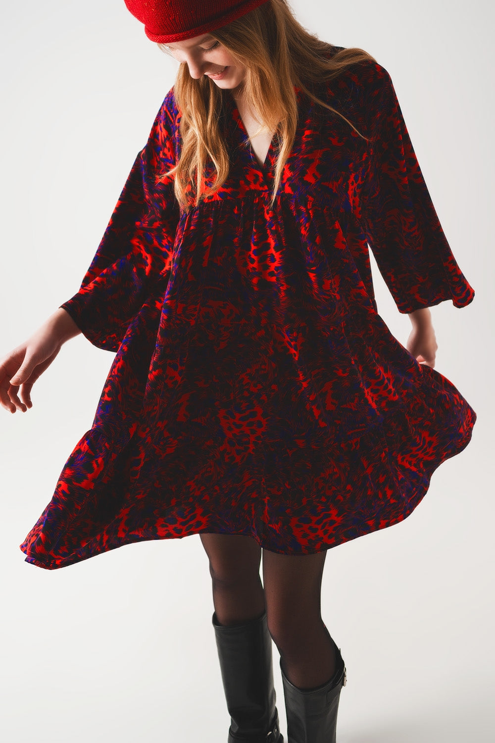 Tiered mini smock dress in animal print in red