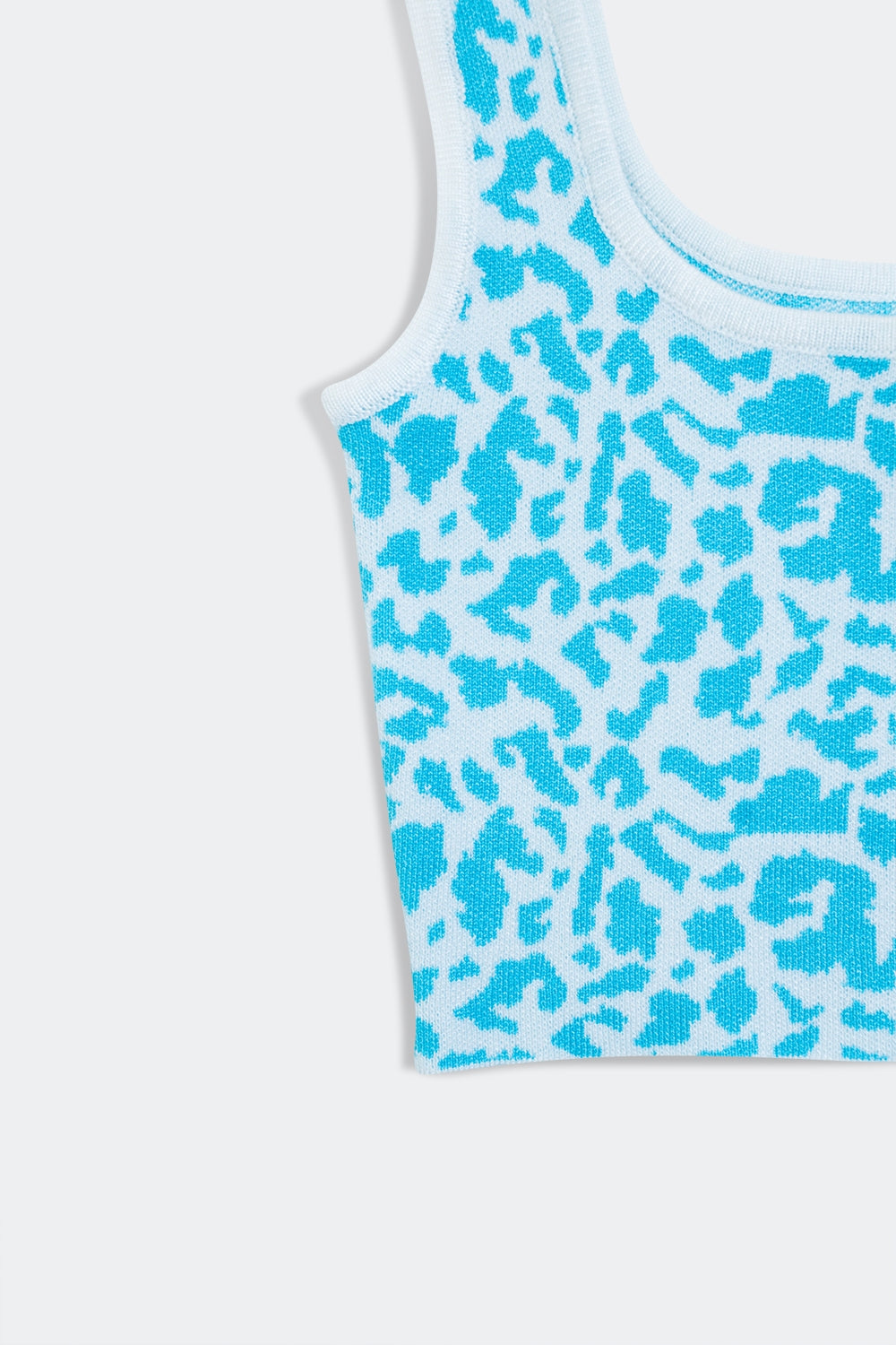 Lightweight knit top in turquoise animal print