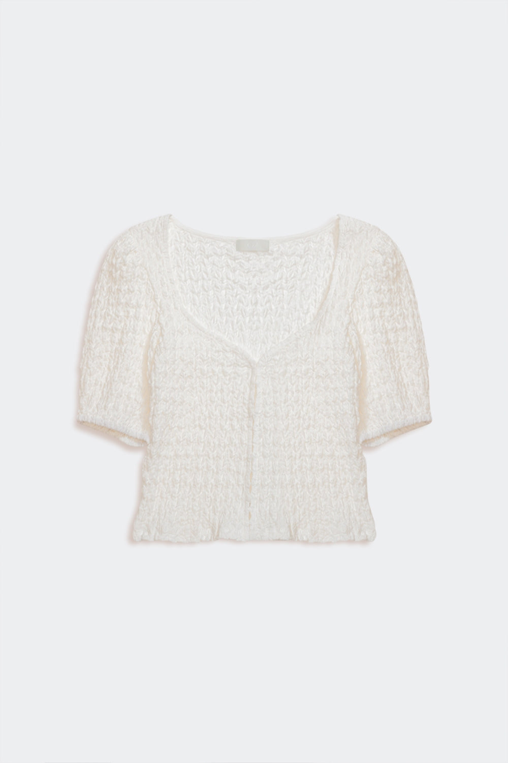 Top with balloon sleeves and hook-and-eye closure in white