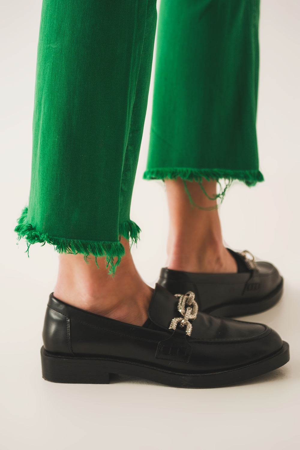 Flare jeans with raw hem edge in bright green