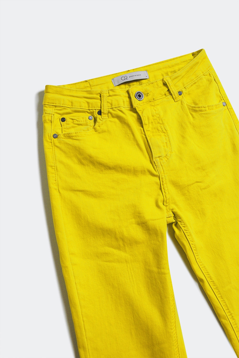 Flare jeans with raw hem edge in yellow