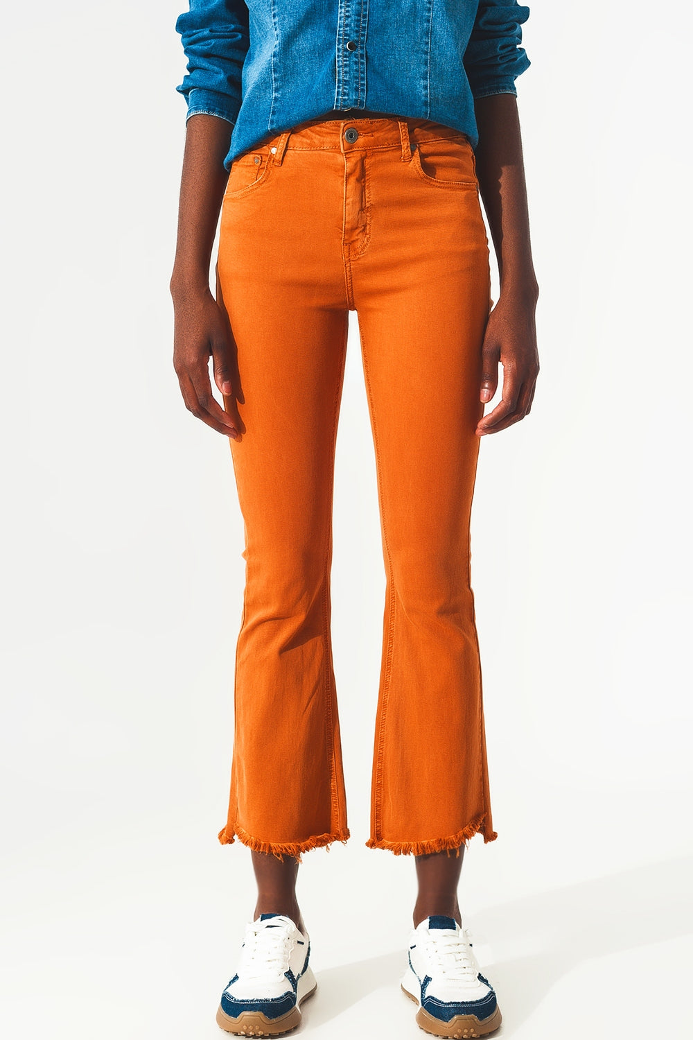 Flare jeans with raw hem edge in orange