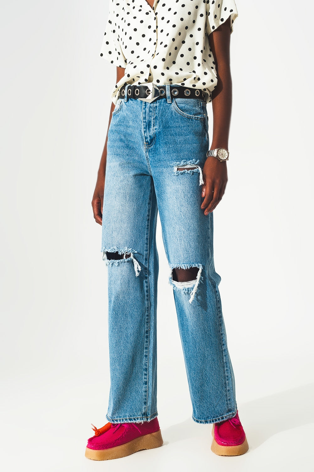 Straight jean in medium wash with rip and split hem