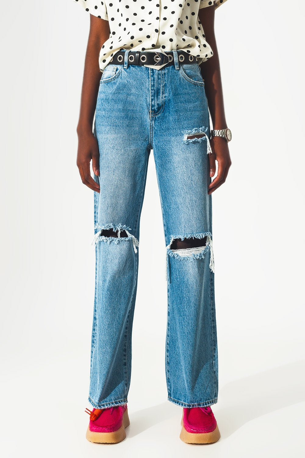 Straight jean in medium wash with rip and split hem