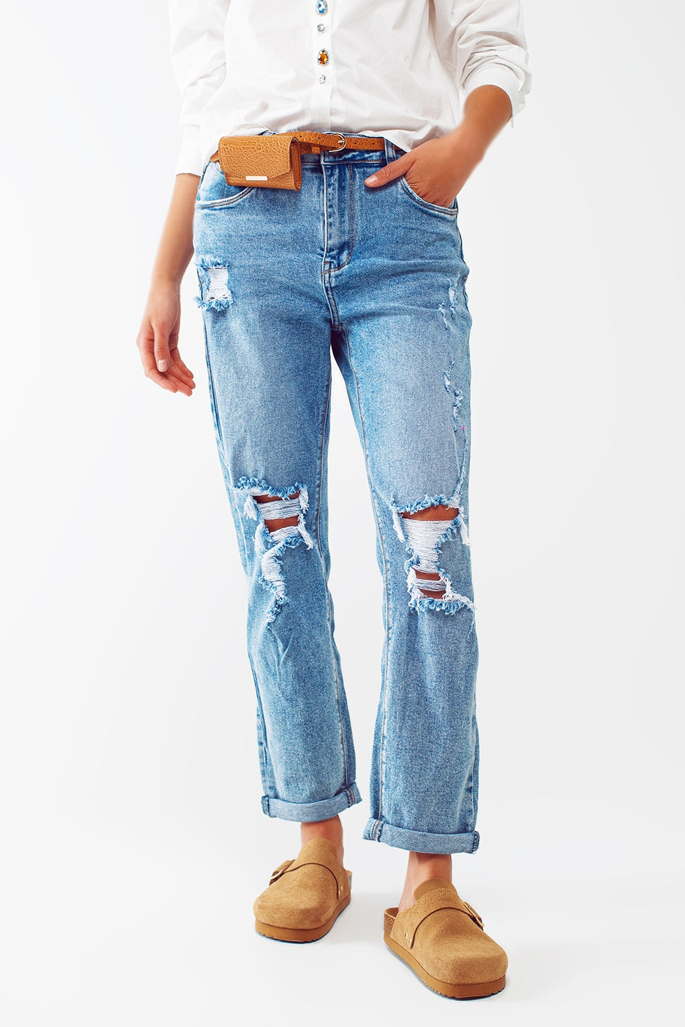 Ripped knee straight leg jeans in light blue wash