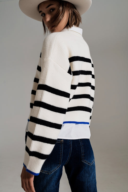 black striped jumper with blue stripe detail on the bottom — view 2 of 5