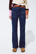Blue jeans with buttoned pocket details in dark wash