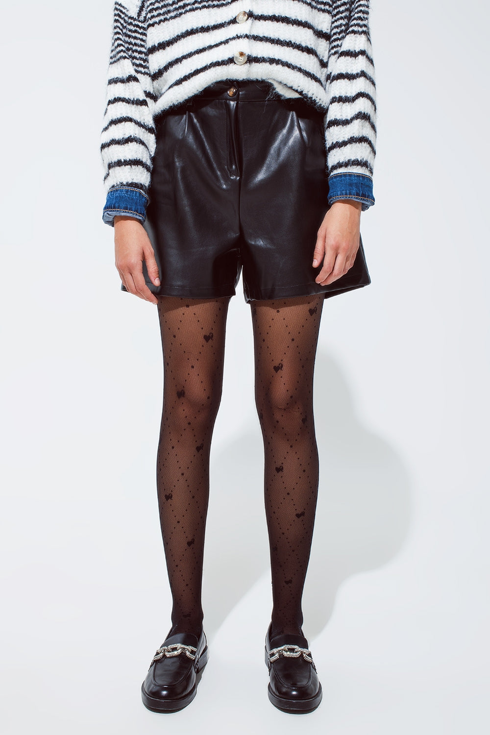 Faux leather oversized shorts with pleat down the front and pockets in black