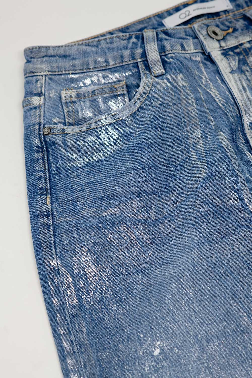 skinny blue jeans with metallic finish in light wash