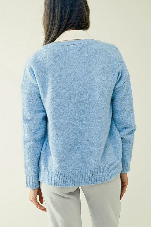 Blue knit cardigan with wide V-neck and button closure