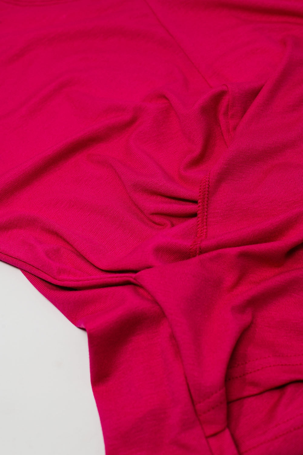 Crew neck T-Shirt with draped design and cap sleeve In Fuschia