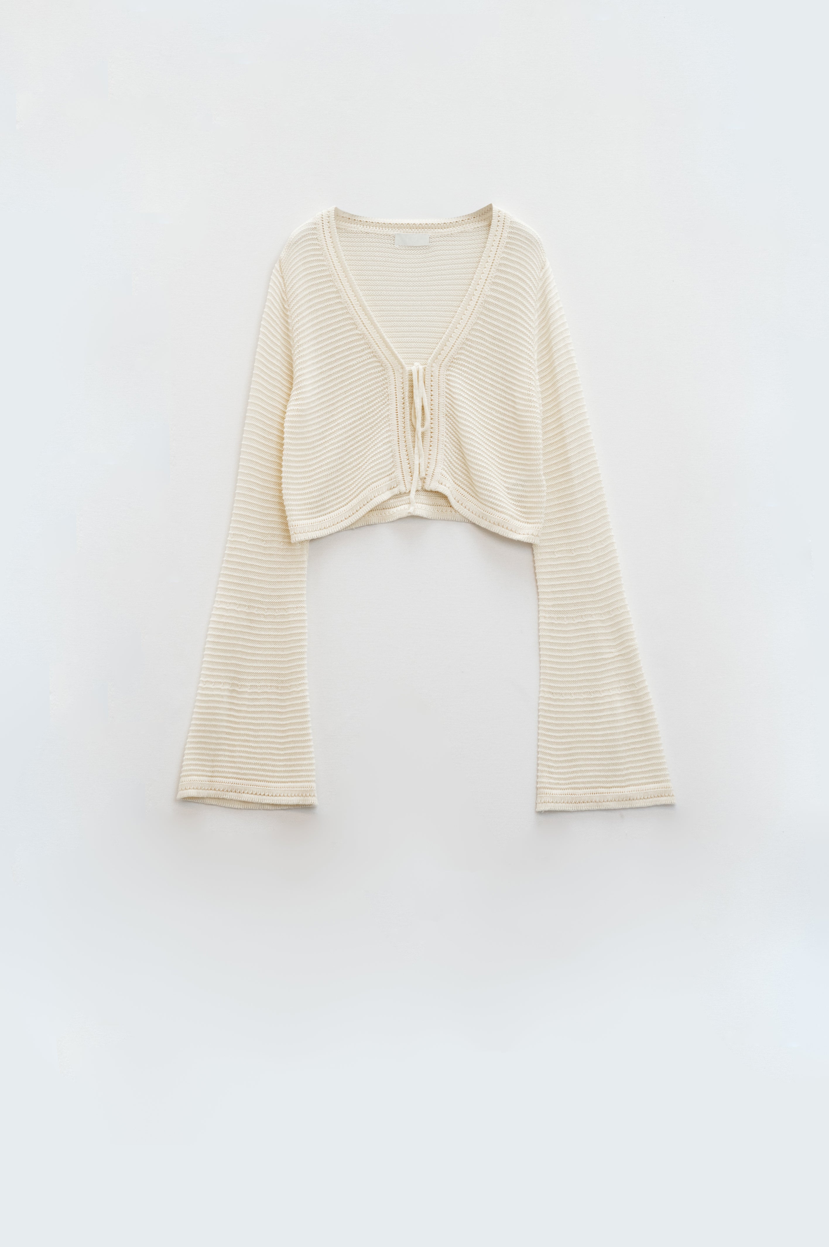 Long Bell Sleeve Knitted Cardigan in Cream With knot detail