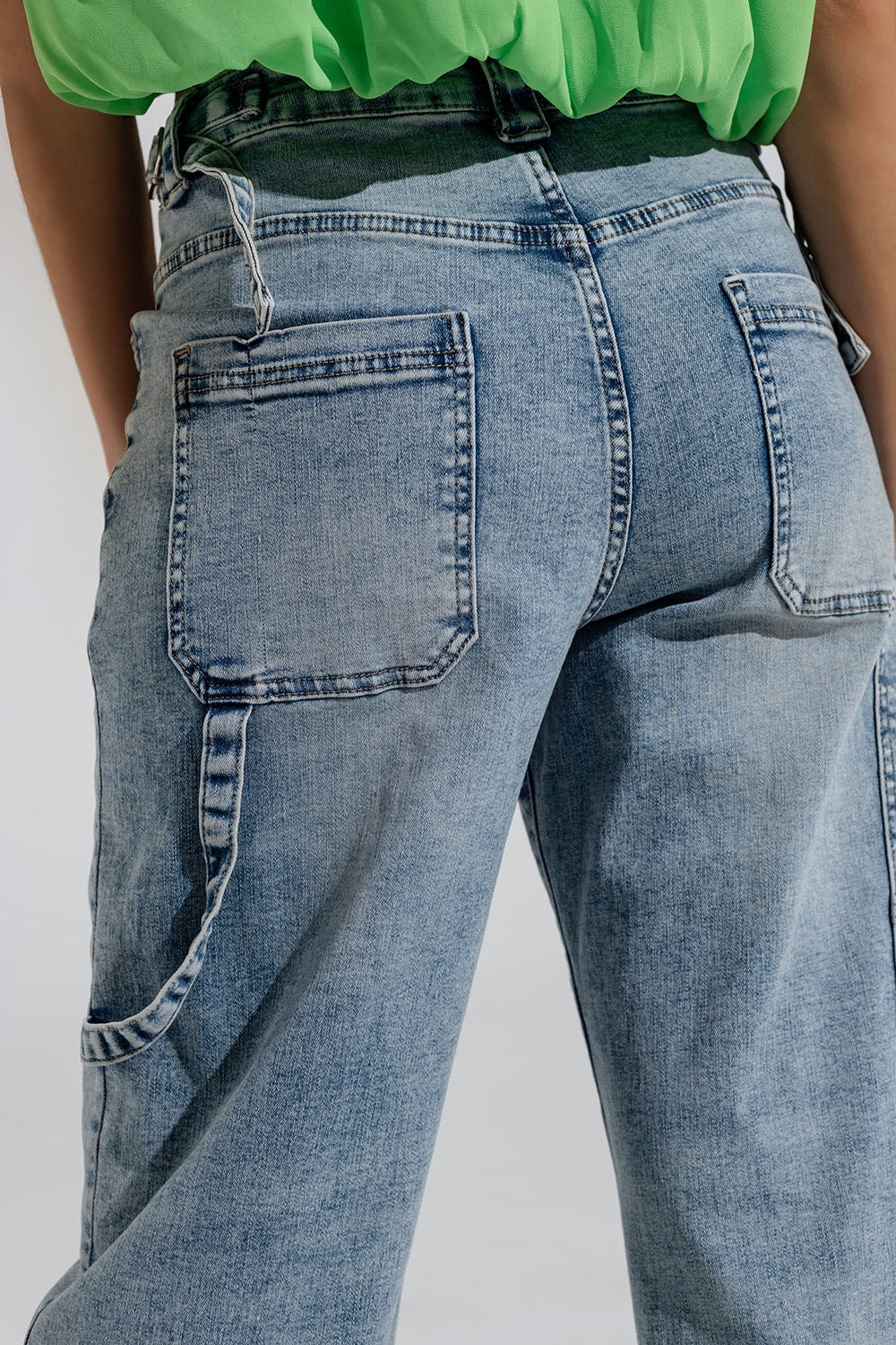Cargo Style Bleached Jeans With Belt Like Strap Details At The Waist