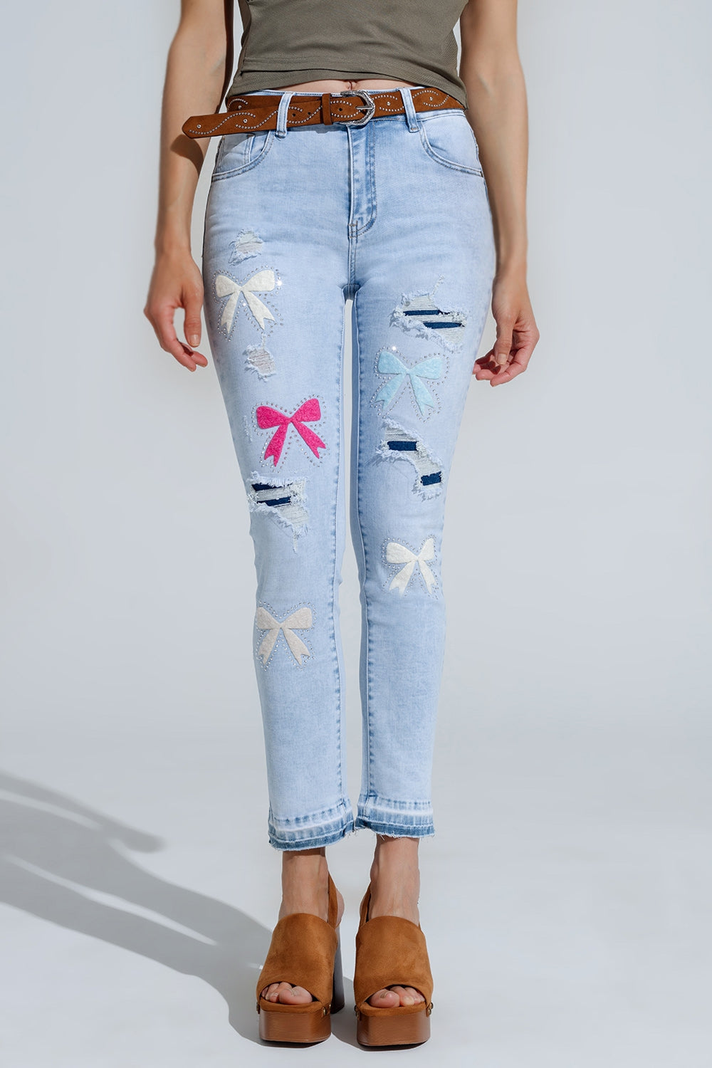 Light Blue super Skinny Jeans With Bow ties and Ripped Holes