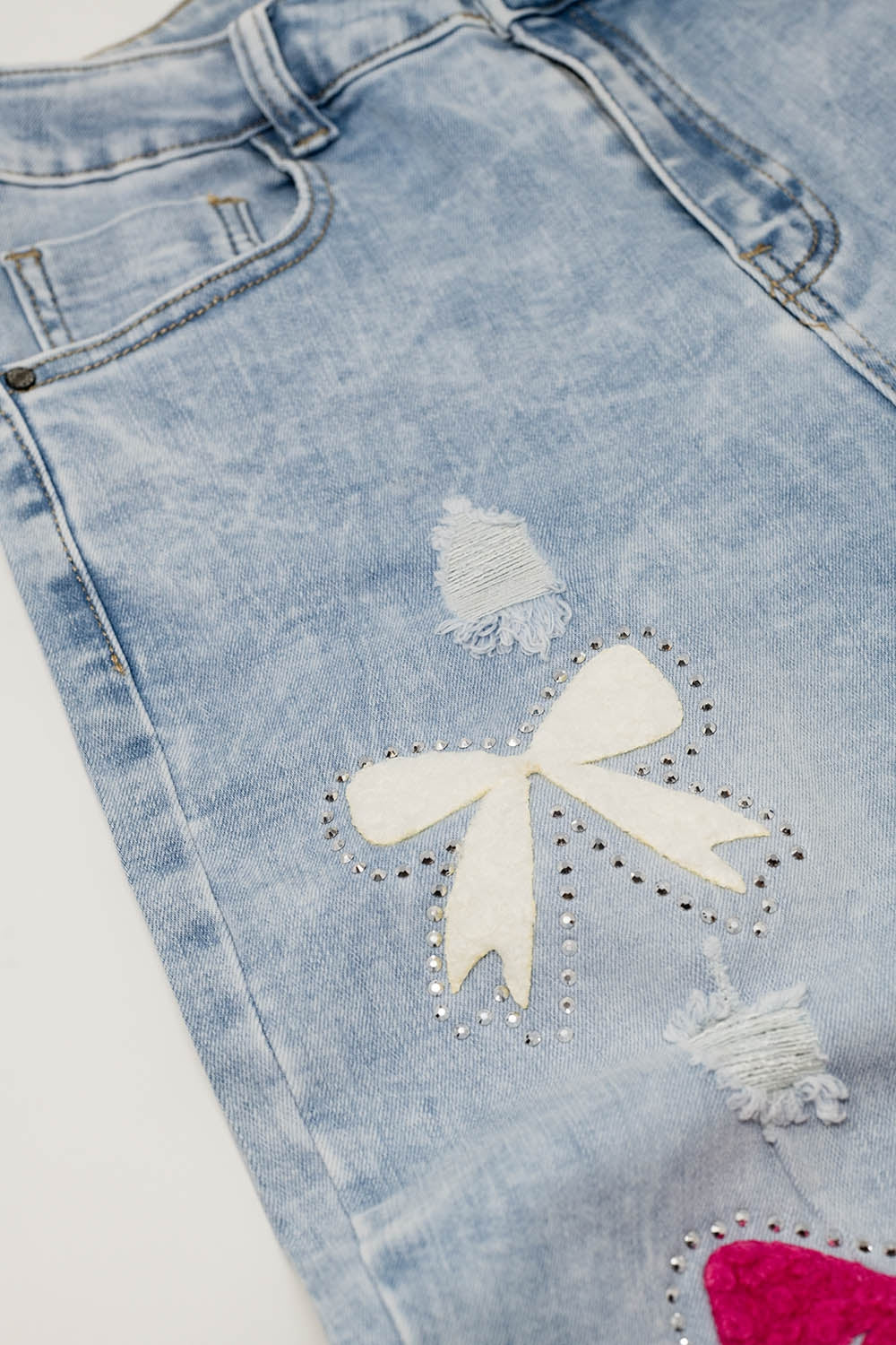 Light Blue super Skinny Jeans With Bow ties and Ripped Holes