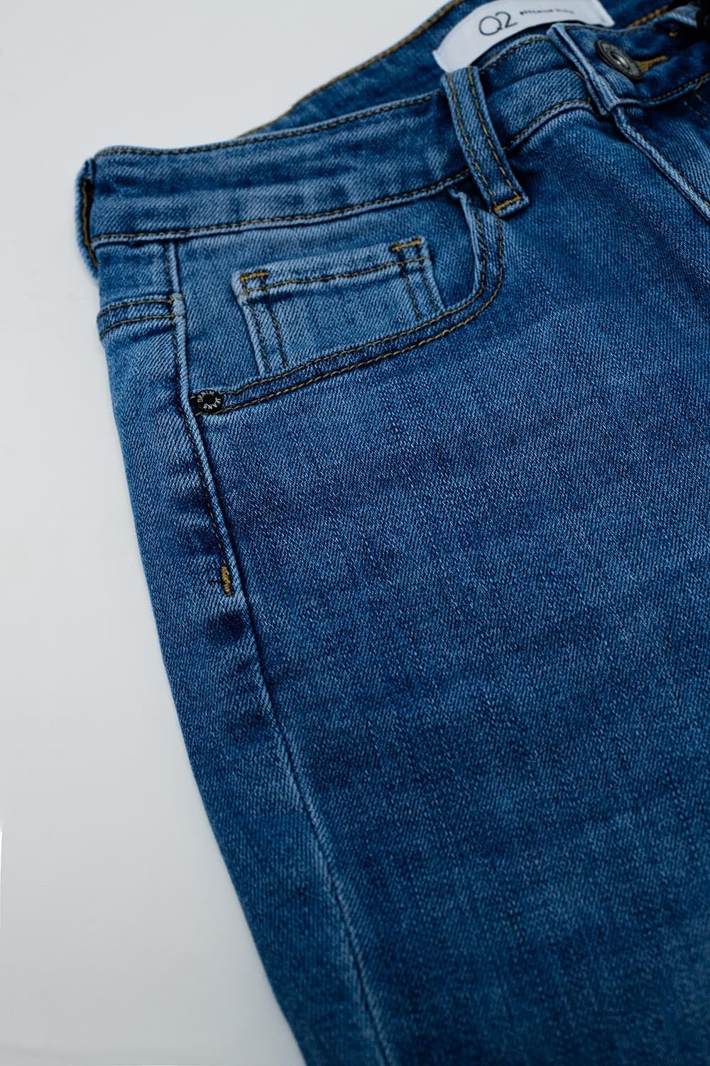 Flared Skinny Jeans With Raw Hem Edge In Mid Wash