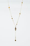 Golden necklace with stone detail and pendant