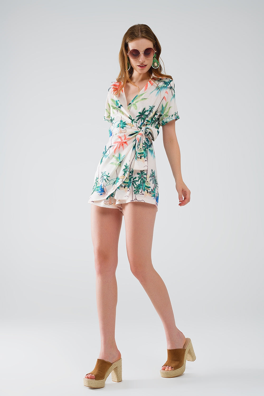 UNIKCOSA Cream Jumpsuit with beach Print and Crossed Top