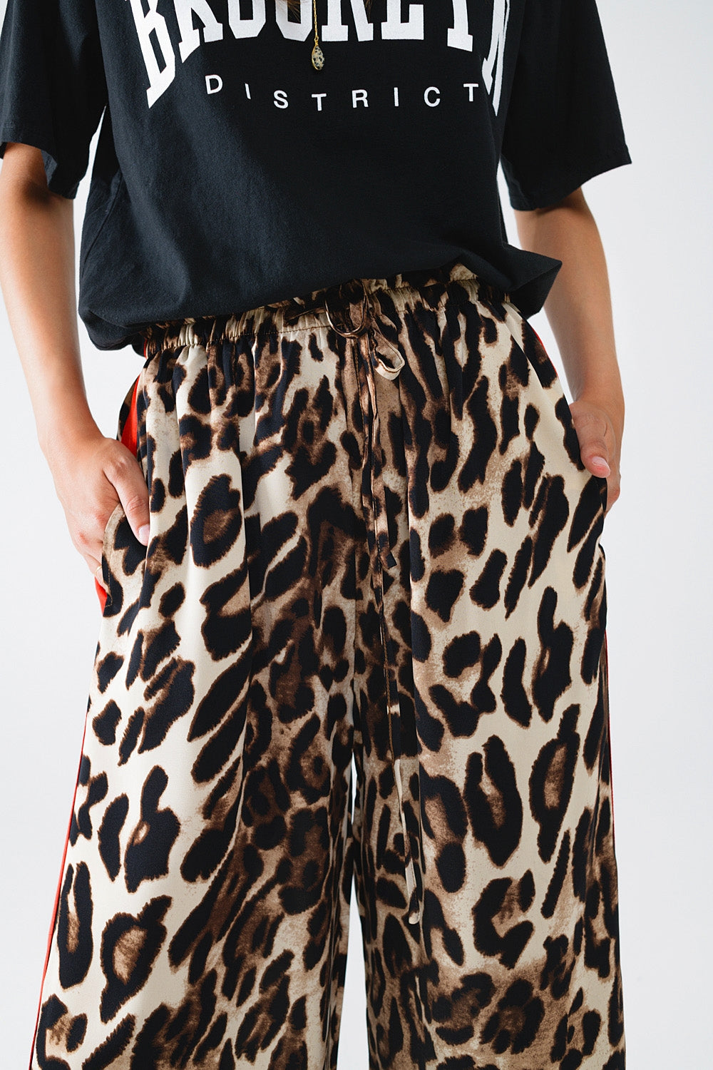 UNIKCOSA Leopard Straight Pants With Red Stripes Down The Sides