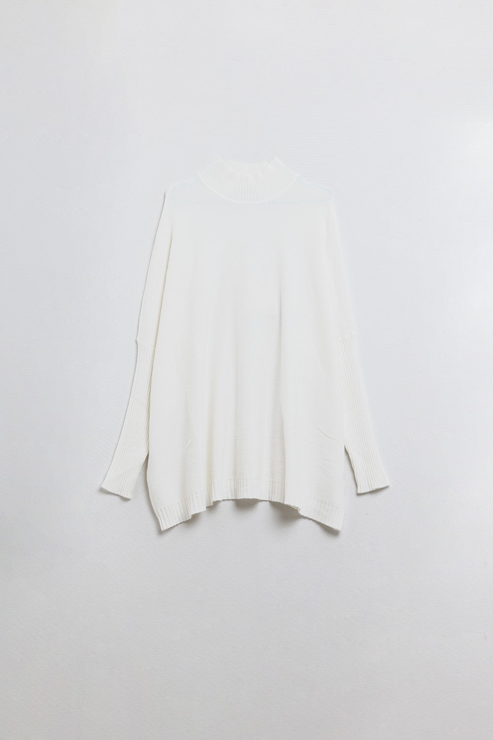oversized soft knitted white sweater with ribbed sleeves